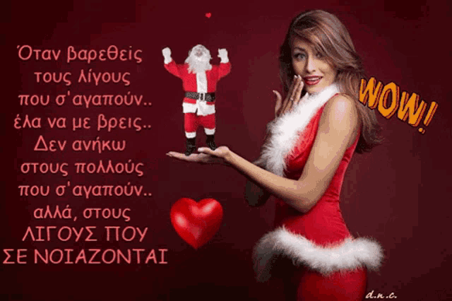 a woman in a santa costume is holding a small santa claus figurine