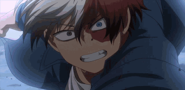 a close up of a person with red and white hair and blue eyes