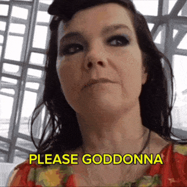 a woman says please goddonna in yellow