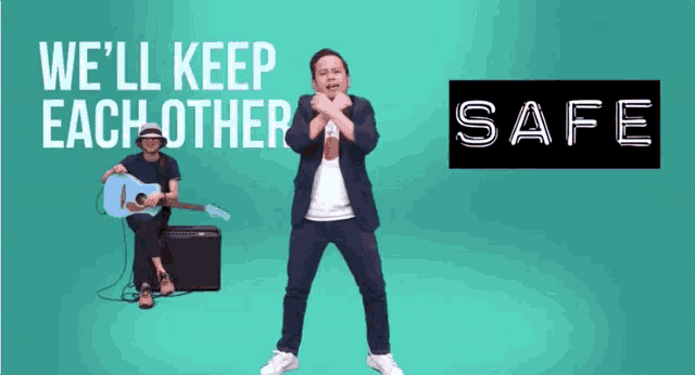 a man is dancing in front of a sign that says we 'll keep each other