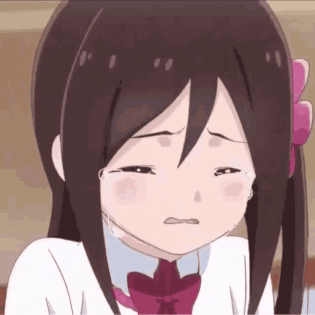 a cartoon girl is crying with tears running down her cheeks