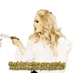 a woman with blonde hair and red lips is wearing a white shirt and earrings and is talking about pokemon .