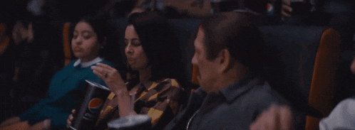 a woman is sitting on a throne of lies while another woman looks on