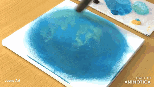 a painting on a canvas with the words made in animatica on the bottom
