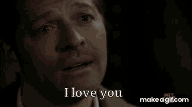 a man is crying and saying `` i love you '' with tears running down his face .