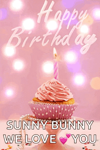 a birthday card with a pink cupcake and a candle