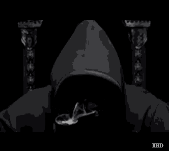 a man in a black hoodie smoking a cigarette with the word hrd below him