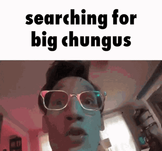 a man wearing glasses is searching for big chungus in a room .