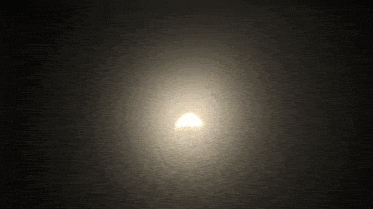 a light shines brightly in the dark