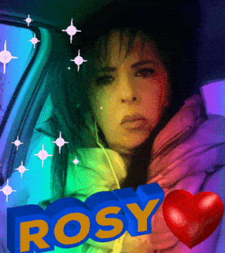 a woman is sitting in a car with the word rosy on the front