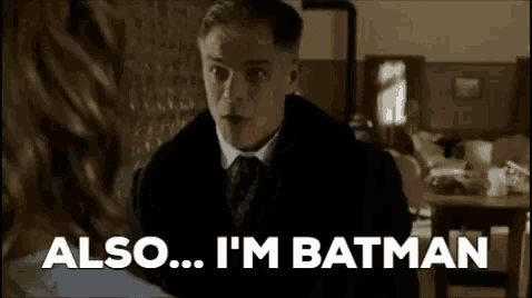 a man in a suit and tie is talking to a woman .