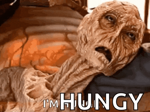 a picture of a monster with the words " i 'm hungry " on it