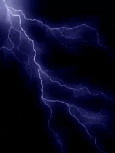 a lightning bolt in the dark sky with a purple background