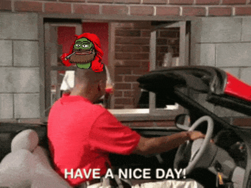 a man in a red shirt is driving a car and says " have a nice day "