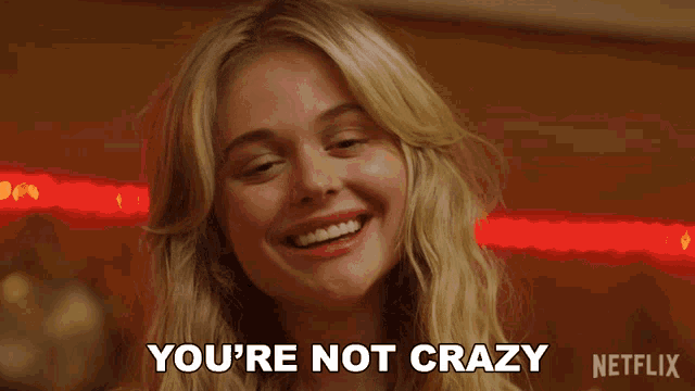 a woman says you 're not crazy in front of a sign that says netflix