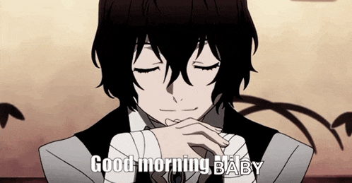 a man in a suit and tie is smiling with his eyes closed and says `` good morning baby '' .