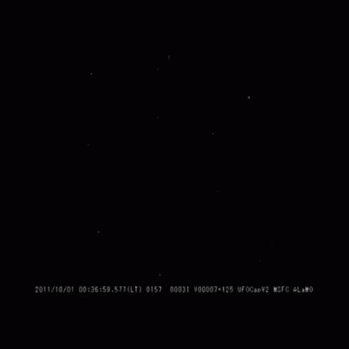 a black and white photo of a shooting star with the date 2011/10/01 at the bottom