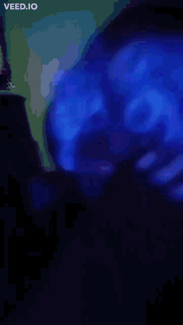 a blue background with the word veed.io on the bottom