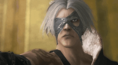a close up of a man wearing a mask