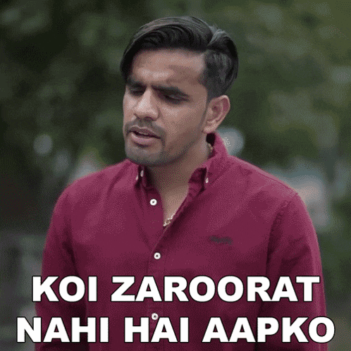 a man in a red shirt says koi zaroorat nahi hai aapko in a foreign language