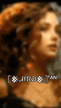 a blurred image of a woman with the letters jfroxj on the bottom