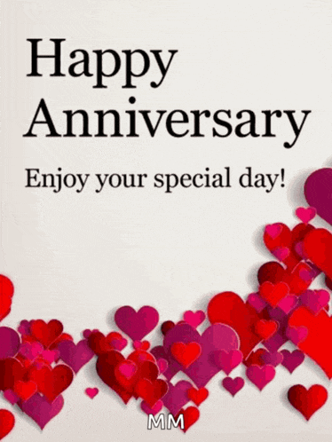 a happy anniversary greeting card with red and pink hearts