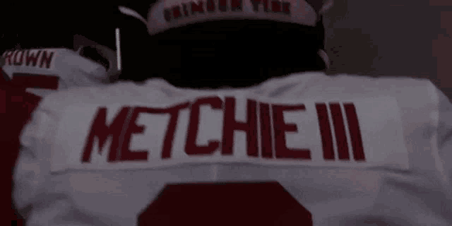 the back of a metchie iii jersey