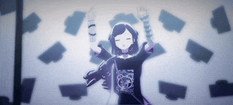 a girl in a black shirt is dancing in front of a wall that has a lot of cards on it
