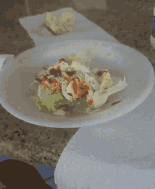 a plate of food is sitting on a table .
