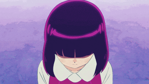 a little girl with purple hair is looking down
