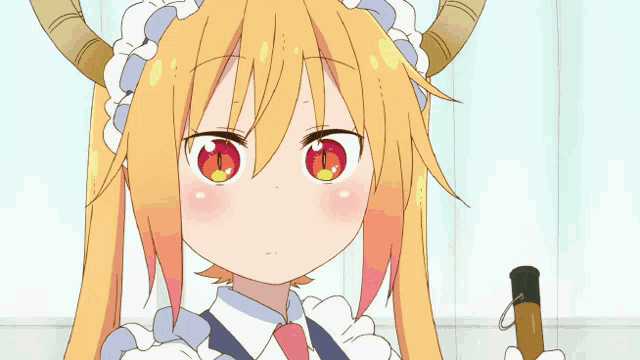 a girl with horns and glasses is standing next to another girl
