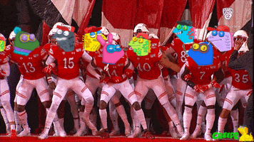 a group of football players with cartoon faces on their uniforms including number 15