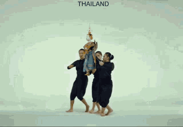 a statue of a woman with the word thailand on the bottom right