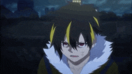 a young boy with black and yellow hair is wearing a fur coat and looking at the camera .