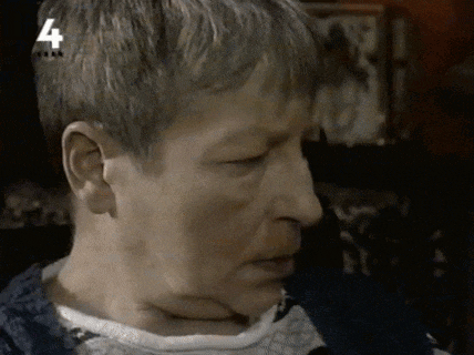a close up of a person 's face with the number 4 on the bottom right