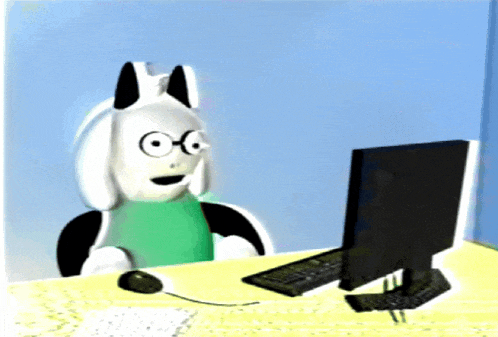 a cartoon character is sitting at a desk with a computer and mouse
