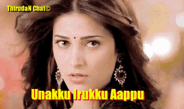 a close up of a woman 's face with the words unakku irukku aappu
