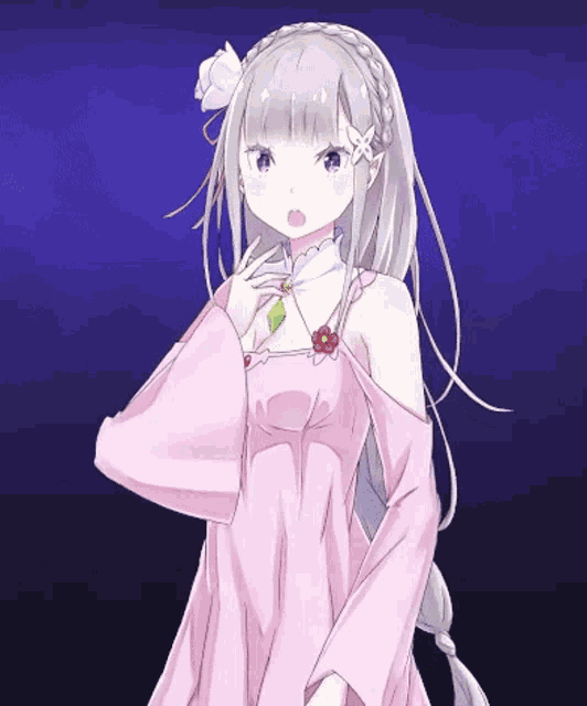 a girl in a pink dress with a flower on her head