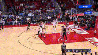 a basketball game is being played on a court that says houston on it