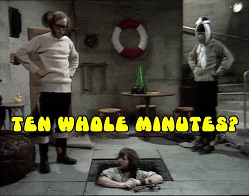 a man is laying in a hole with the words ten whole minutes written above him