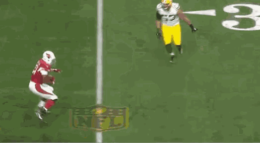 a football player with the number 31 on his jersey is running on the field