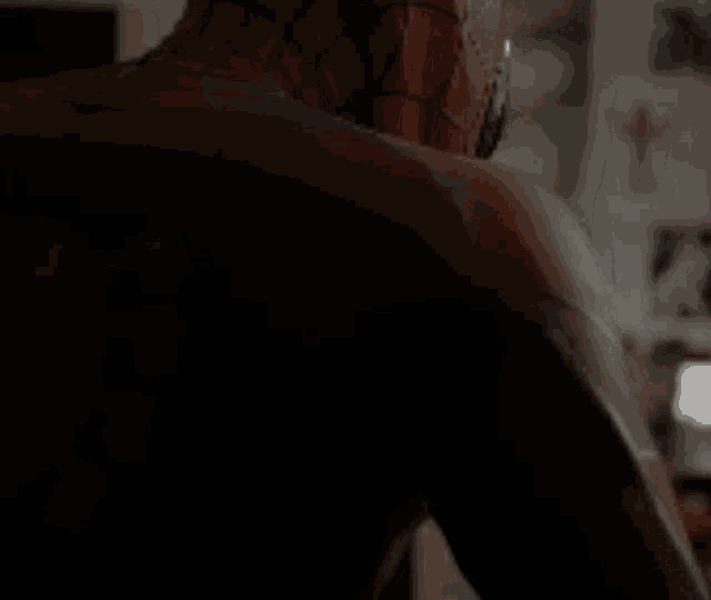 a close up of a person in a spiderman costume