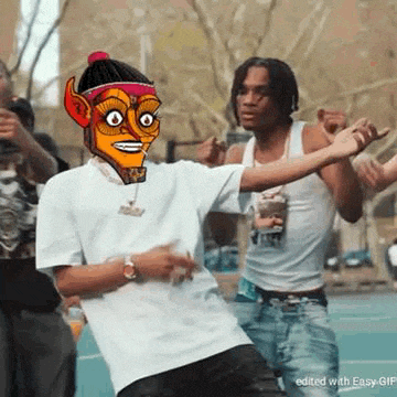 a man with a mask on his face is dancing on a basketball court with other men .