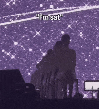 a group of people sitting in front of a purple background with the words " i 'm sat " above them