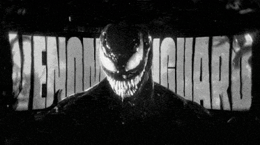 a black and white photo of venom with the words venom guards behind him