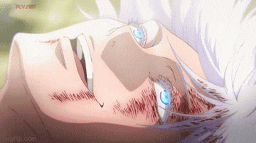 a close up of a person 's face with blood on it .