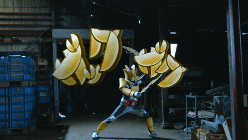 a man in a superhero costume is holding a bat and a sword