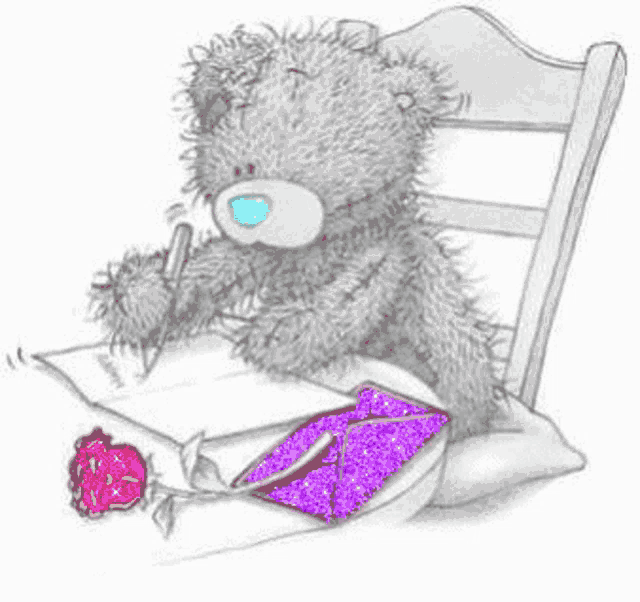 a teddy bear is sitting in a chair writing on a piece of paper next to a purple envelope .