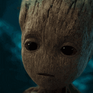 a close up of a baby groot from guardians of the galaxy making a face