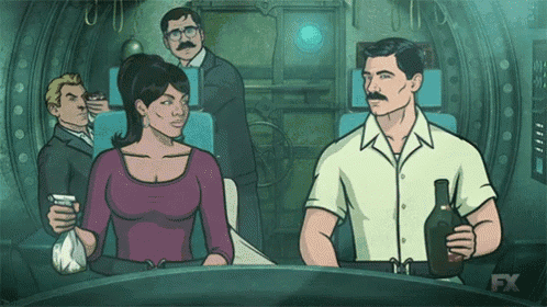 a man is holding a bottle of whiskey while a woman looks on